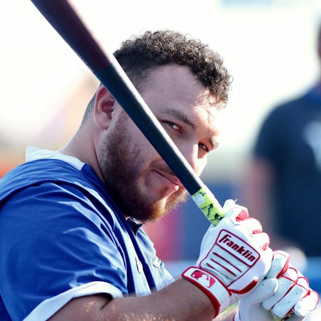 Alejandro holding Bat